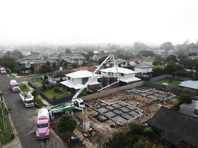 Concrete pump and crew working on residential foundations in Mount Waverley