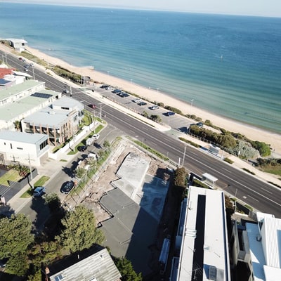 Aerial view of a concrete foundation on a bayside construction site